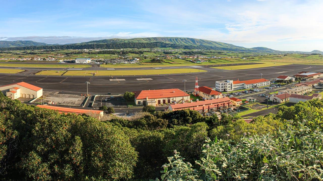 View of Lajes Field in Azores, Portugal, with mountains in the background